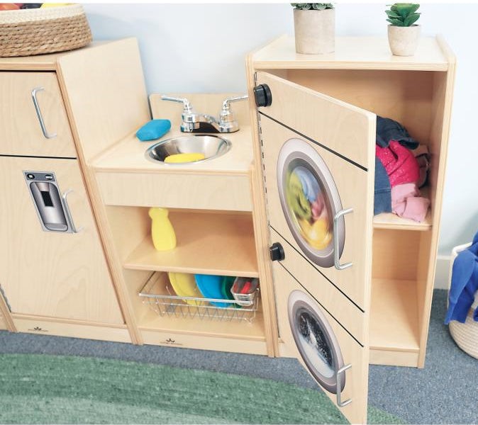 Open washer unit of WB2070 - Play Toddler Kitchen Ensemble showing colorful clothes inside, part of preschool pretend play furniture set.