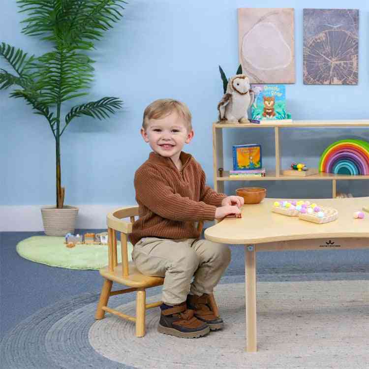 WB7178 - Bentwood Back Maple Toddler Chair 7"H in preschool setting with toddler seated at activity table. Ergonomic maple design supports comfort and posture.
