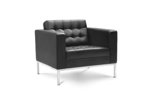 Black leather sofa with a tufted seat and back, featuring clean lines and metal legs